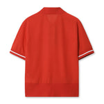 Back view of women's mesh golf polo - unique texture