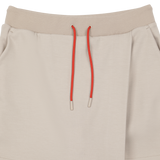 Wrap-over front panel for a clean layered look
Clean waistband with a basic drawstring
Relaxed silhouette for easy movement.