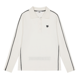Soft knit polo with a slogan graphic
Front WAACKY logo detail
Comfortable texture with a casual WAAC mood