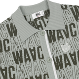 Short-sleeve cardigan with an all-over WAAC pattern
Contrast stripe trim at the cuffs and placket
Light knit texture for everyday wear