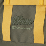 Color Tote Bag
with a two-tone panel design
Front slogan print and WAACKY emblem
Functional compartments for daily carry