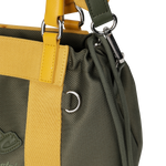 Color Tote Bag
with a two-tone panel design
Front slogan print and WAACKY emblem
Functional compartments for daily carry