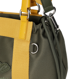 Color Tote Bag
with a two-tone panel design
Front slogan print and WAACKY emblem
Functional compartments for daily carry