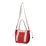 Color Tote Bag
with a two-tone panel design
Front slogan print and WAACKY emblem
Functional compartments for daily carry
