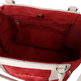 Color Tote Bag
with a two-tone panel design
Front slogan print and WAACKY emblem
Functional compartments for daily carry