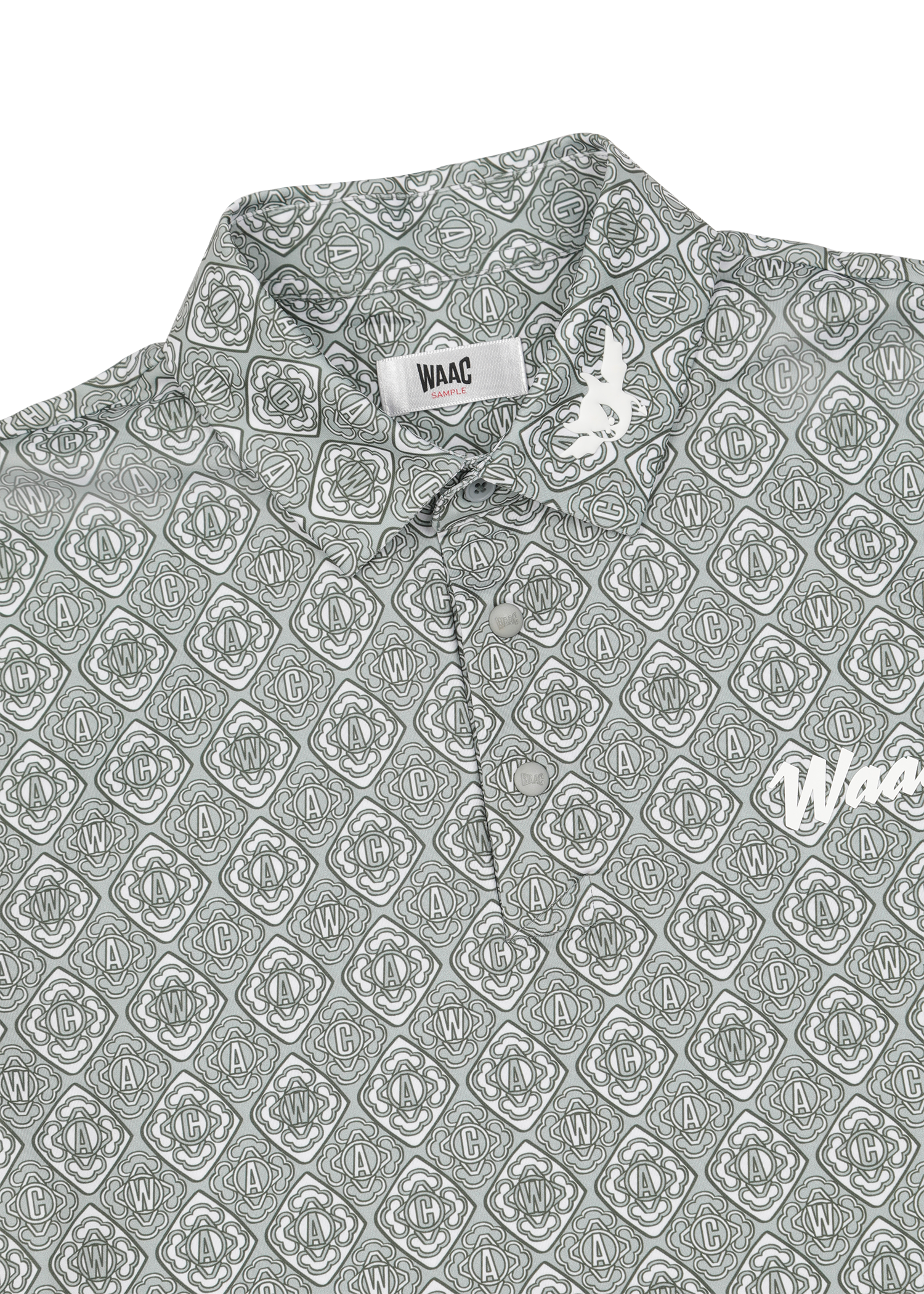 Lightweight stretch polo with a K monogram pattern
Front WAAC logo detail
Subtle sleeve graphic point