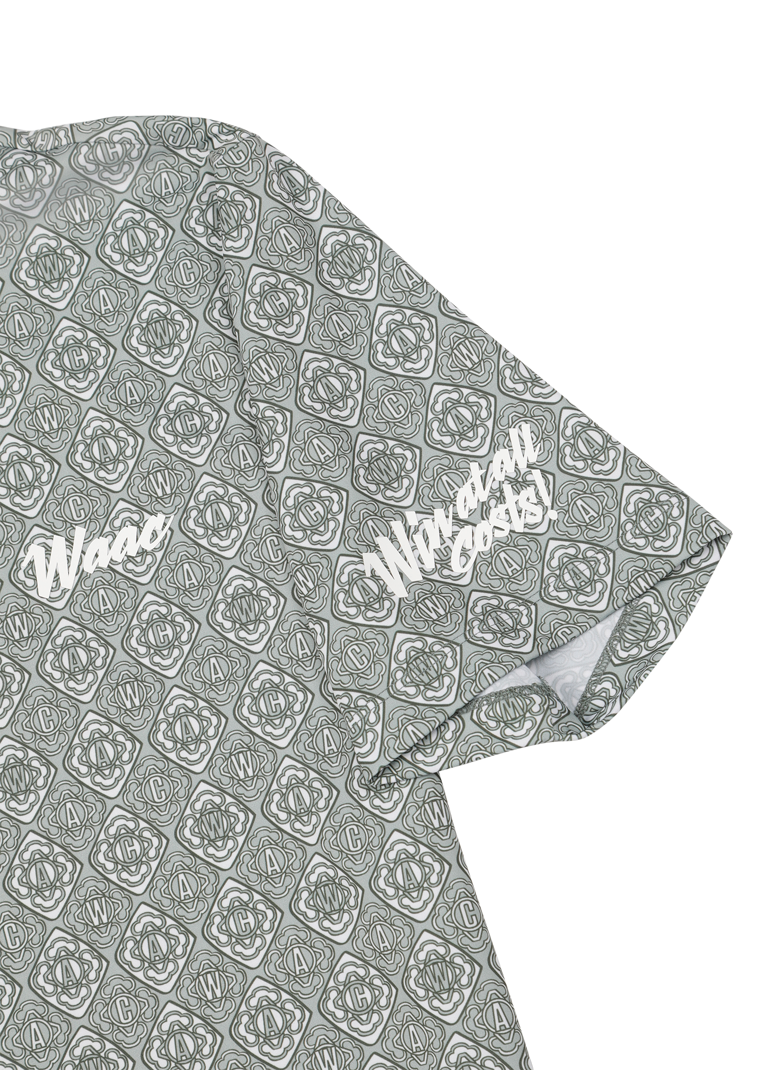 Lightweight stretch polo with a K monogram pattern
Front WAAC logo detail
Subtle sleeve graphic point