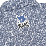 Lightweight stretch polo with a K monogram pattern
Front WAAC logo detail
Subtle sleeve graphic point