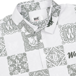 Lightweight stretch polo with a K checkboard pattern
Front WAAC logo detail
Pattern based visual point