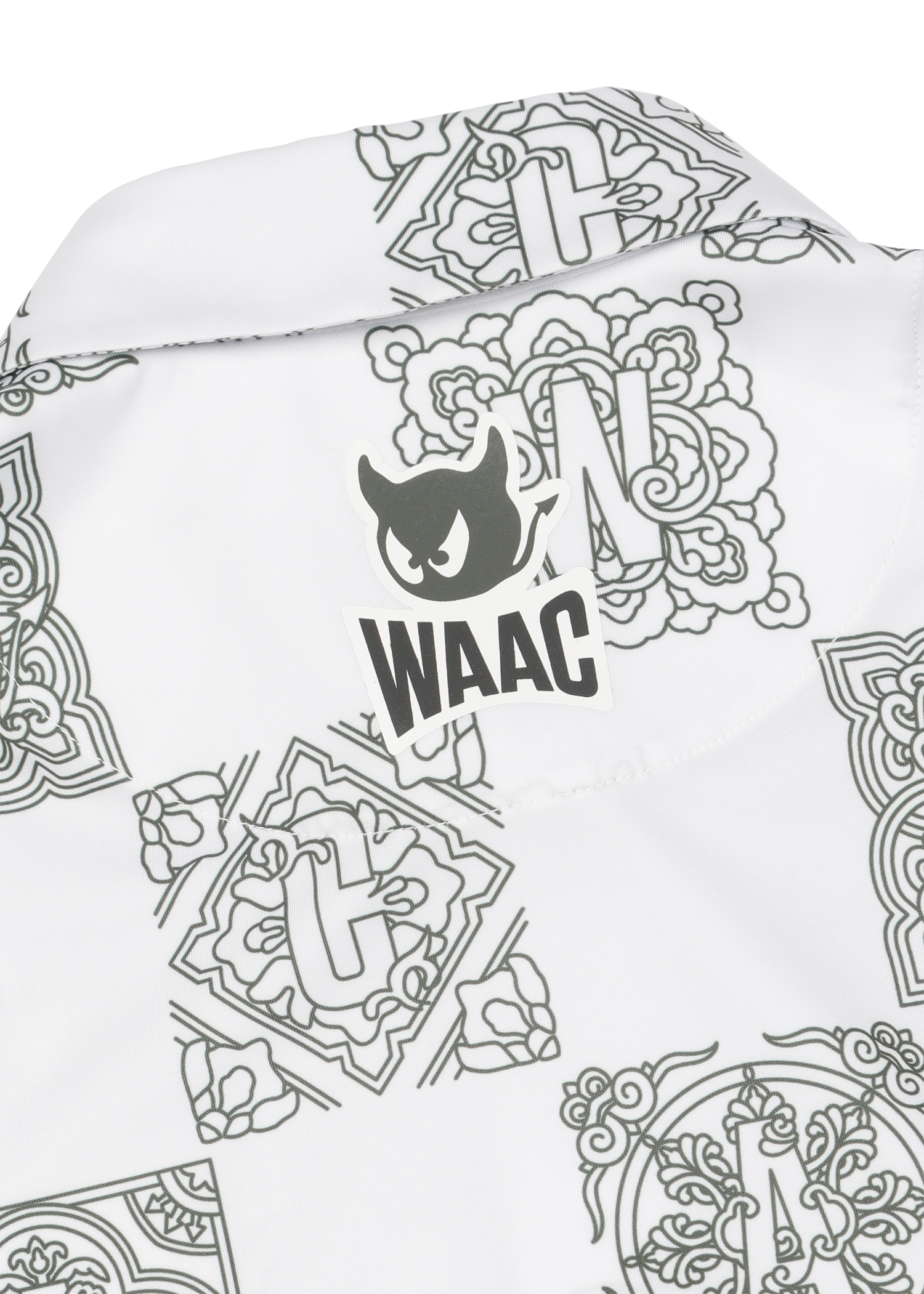 Lightweight stretch polo with a K checkboard pattern
Front WAAC logo detail
Pattern based visual point