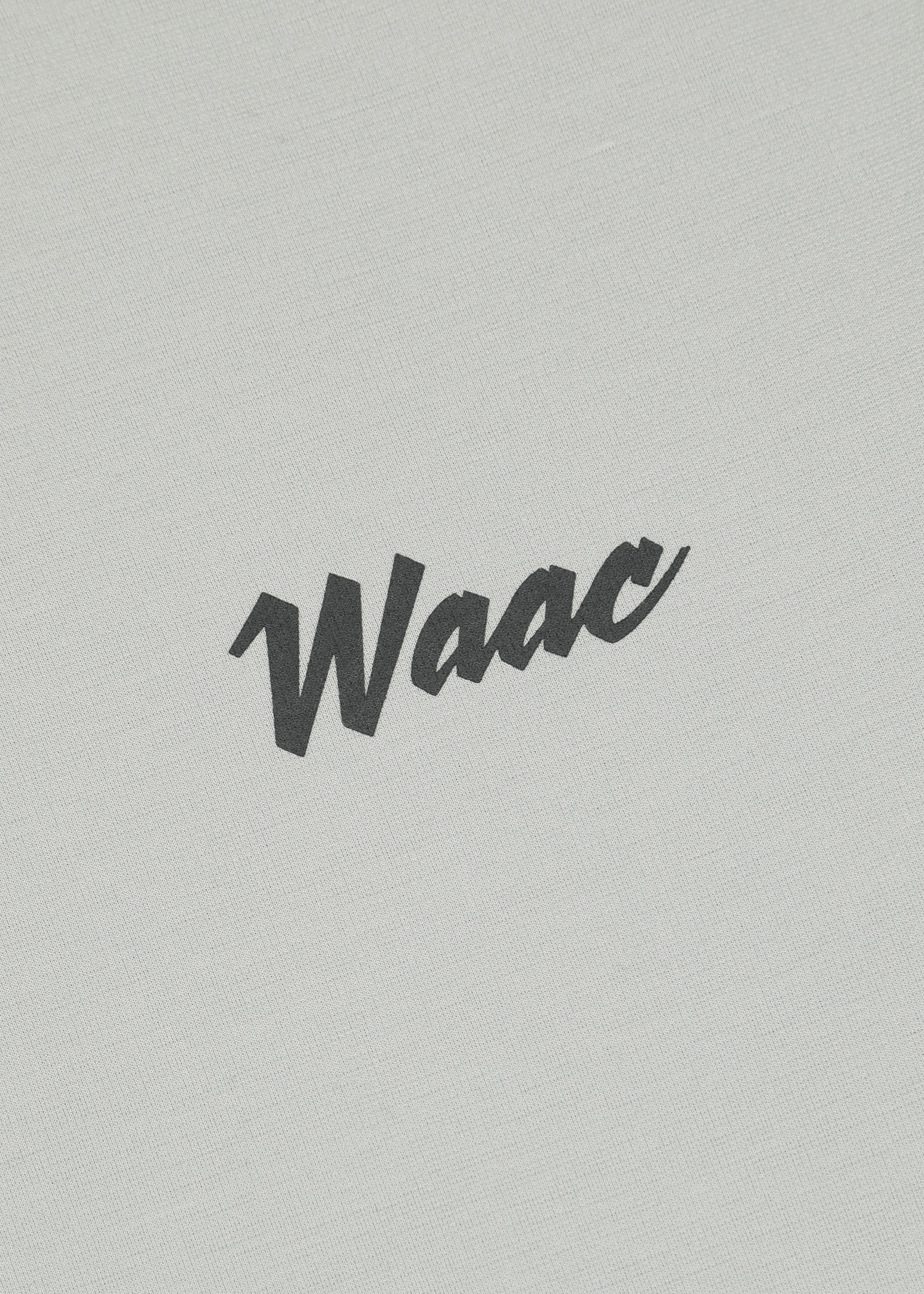 Soft jersey T shirt with a front WAAC logo detail
Back K Dragon WAACKY graphic
Sleeve logo point