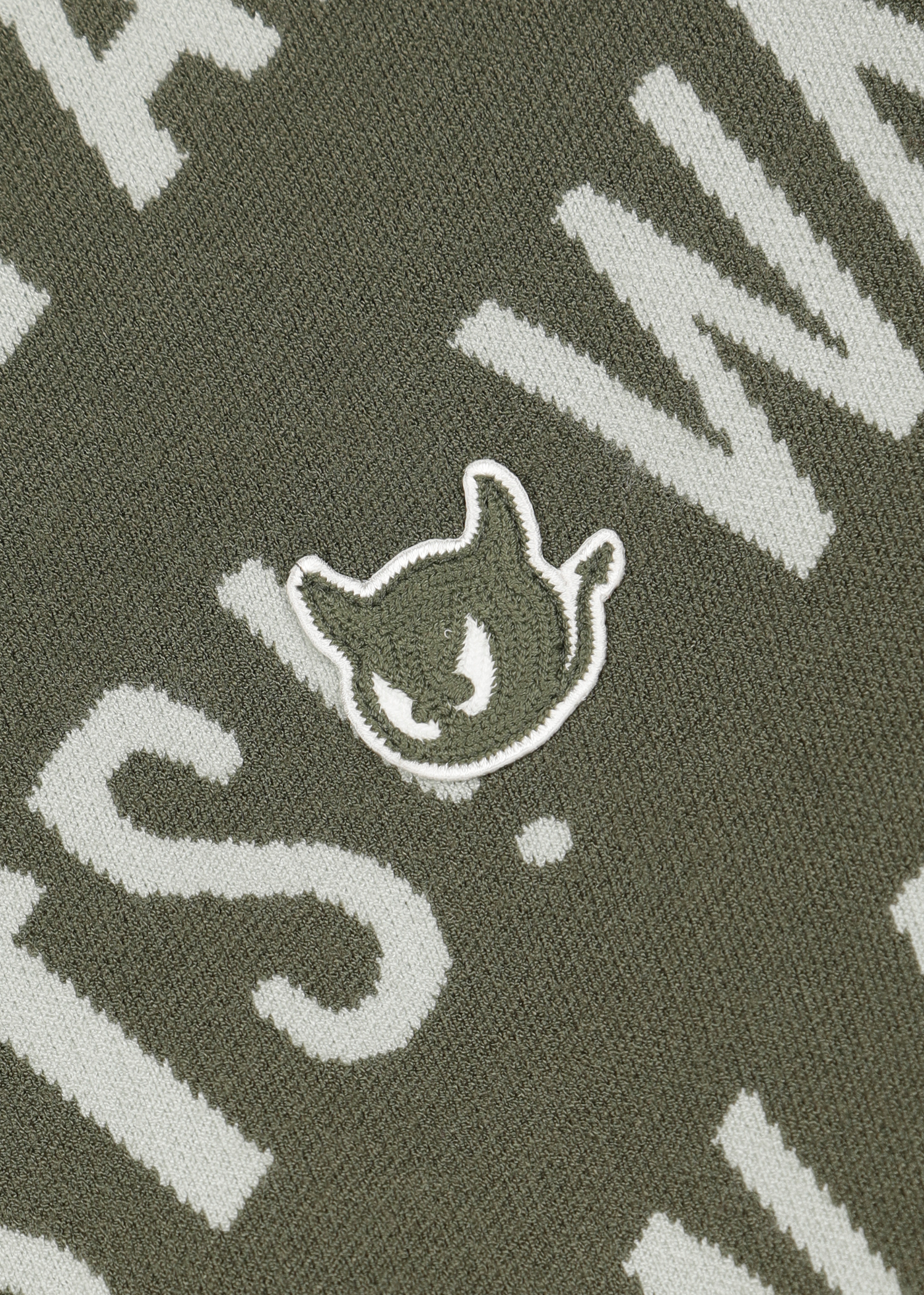 Soft regular fit round neck sweater
Diagonal all-over WAAC slogan pattern
Ribbed trims for a clean finish