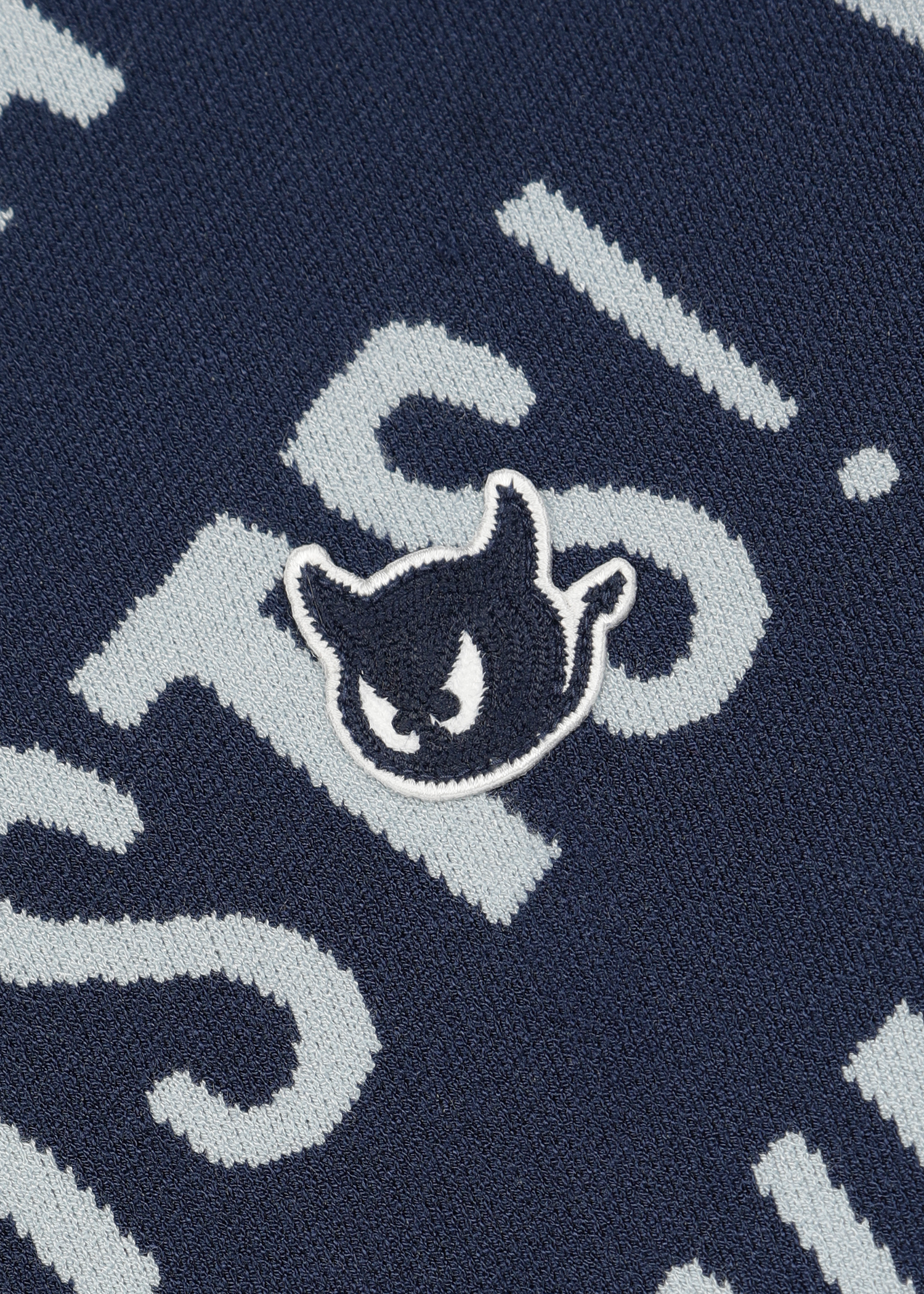Soft regular fit round neck sweater
Diagonal all-over WAAC slogan pattern
Ribbed trims for a clean finish